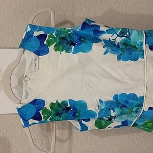 Calvin Klein white dress with blue floral embellishments, size 2